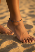 Chaîne portée sur pied de femme