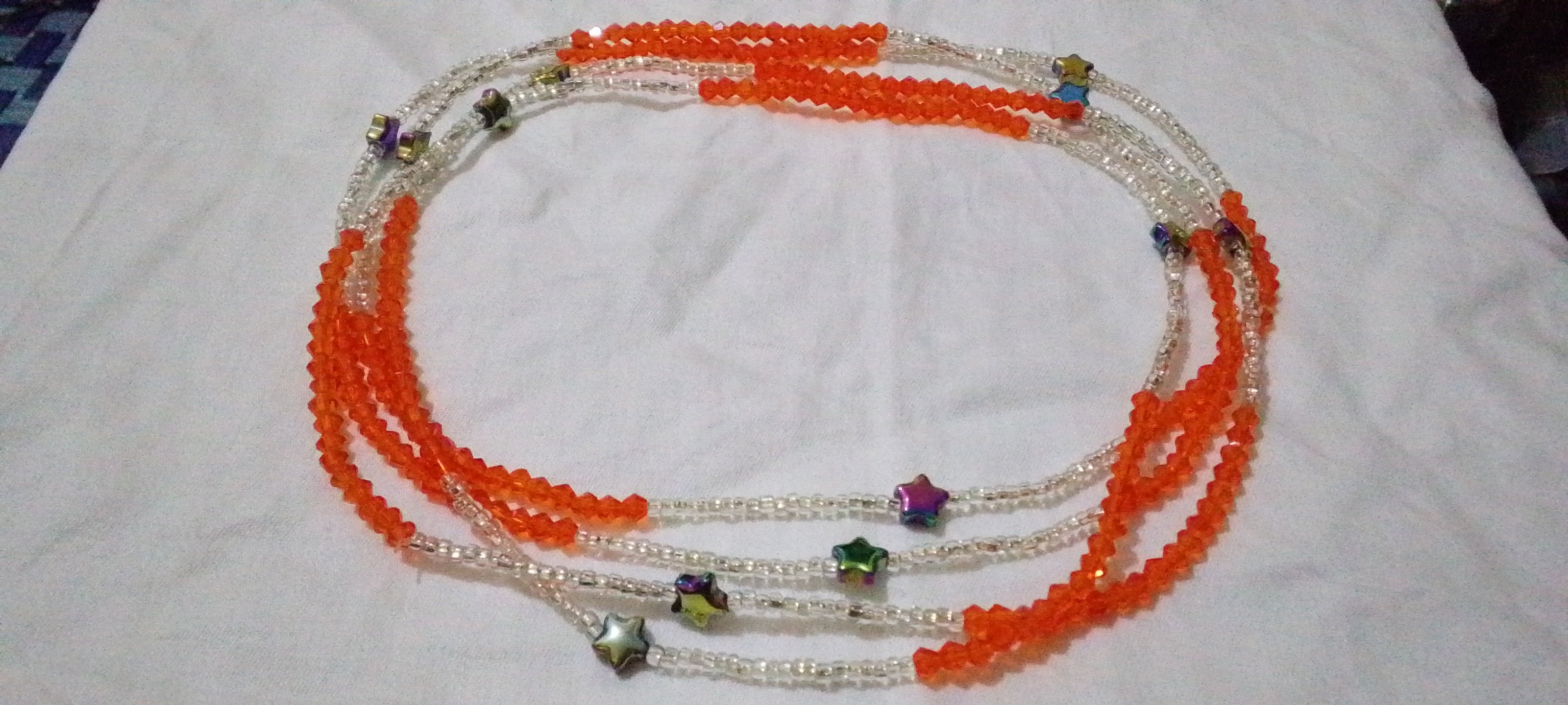 Baya Flamme & Cristal —2 Chaînes de Taille Artisanales Orange & Étoiles et blanc
